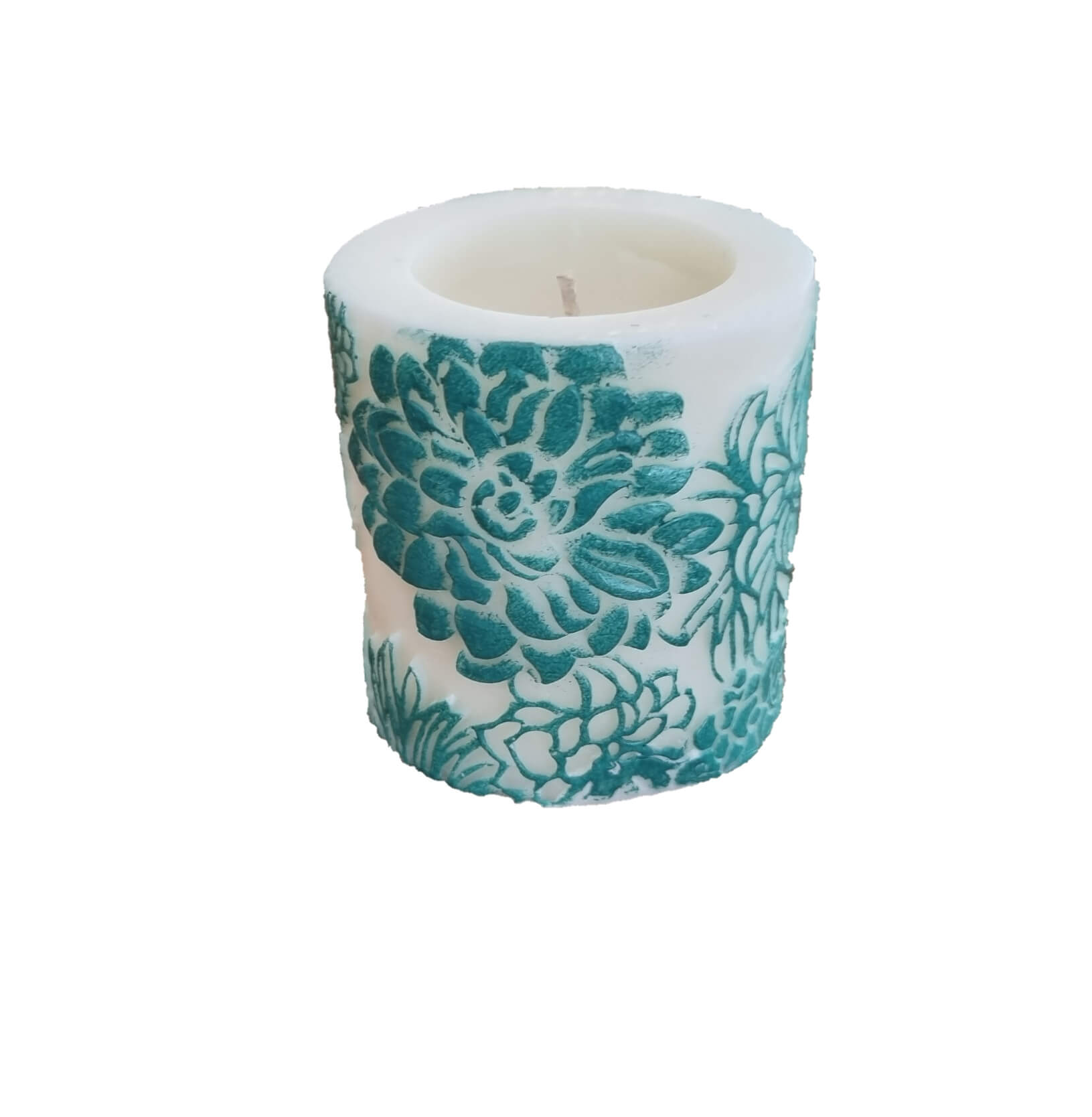 Candle with teal floral pattern on a white background